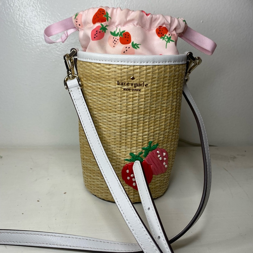 Cute small Kate spade strawberry purse for the beach.